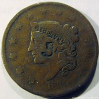 Obverse side of the 1835 Large Cent showing Liberty head with '5' punch counterstamp on cheek and stars around edge.