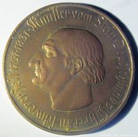 Obverse of 1923 German Notgeld coin showing profile portrait with German text