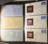 Image of album pages showing Lacemaking First Day Covers with corresponding 24K gold foil replicas and informational text.