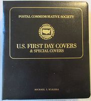 Front cover of the Postal Commemorative Society album with gold embossed text and name.