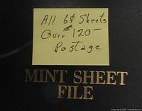 Front cover of binder embossed “MINT SHEET FILE” with sticky note reading “All 6¢ Sheets Over 120= Postage”