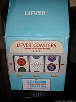 Photo of Lifver branded box showing ceramic coaster patterns and branding.