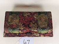 Top and front view of Victorian celluloid fitted dresser box with floral and portraits of women on top lid.