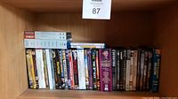 Shelf with a variety of DVD and Blu-ray cases including classic films, series, and collections.