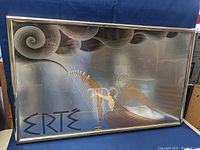Framed vintage art deco ERTE poster showing full artwork with stylized figure and harp.