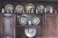 Overall view of lot displayed on wooden cabinet