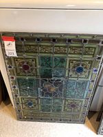 Full front view of panel leaning against white surface