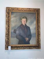 Full front view of the oil painting depicting a woman holding a rifle in an ornate gilt frame.