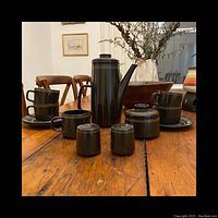 Full set of vintage Mikasa Majorca coffee set displayed on wooden table, including cups, saucers, coffee pot, sugar bowl, cream jug, and salt and pepper shakers.