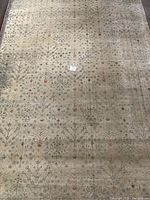 Full view of the ROMDRUP area rug showing overall pattern and colors.