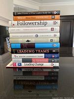 Stacked view of 12 Harvard Business School leadership books showing titles and condition.