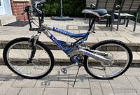 Full side view of Infinity Vortex 600 aluminum dual-suspension mountain bike