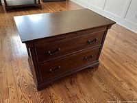 Front view of cabinet showing two drawers and top surface