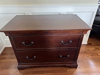 Front view of cabinet showing two drawers and rope-style handles