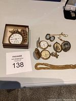 Boxed pocket watch with thick chain, white enamel dial