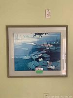 Front view of the framed print showing the water lily pond artwork