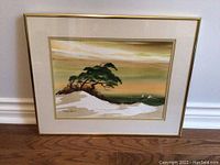 Full view of framed art print showing the complete artwork, matting, and gold frame.