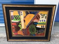 Full view of colorful abstract framed artwork with geometric shapes and patterns.