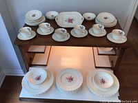 Full set of Spode Billingsley Rose china displayed on table, includes plates, cups, saucers, and serving tray.