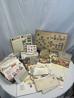 Overall view of stamp albums, loose stamps in boxes and cover envelopes