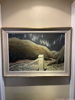 Full view of framed painting mounted on wall