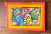 Full view of the small abstract painting on canvas showing bright colors and textured surface with a yellow-orange gradient border.