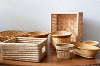 All baskets arranged on table showing various sizes and shapes.