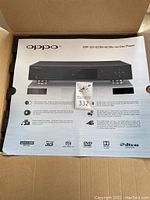 Sealed retail box showing OPPO branding, product image and feature icons