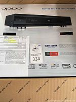 Front of sealed Oppo BDP-95 Blu-ray Disc Player retail box showing model name and logos.