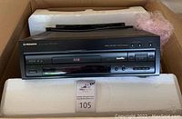 Front view of unit in styrofoam packaging