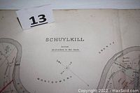 Close-up of map title 'SCHUYLKILL' with compass rose and scale showing 90 perches to the inch, partial river boundary and township borders.