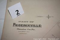 Close-up photo of map title 'Part of Phoenixville Chester Co. Pa.' from map plate #186 showing scale and copyright year 1883.