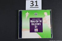 World Cup '94 Collector's Set packaging in green with purple label featuring soccer players and official seals.