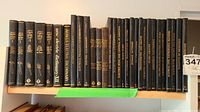 Shelf of vintage technical books mostly on electrical engineering topics