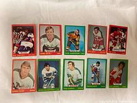 Front side of 10 hockey cards from 1973-74 O-Pee-Chee series showing players Phil Roberto, Dennis Hotal, Frank Mahovlich, Rod Gilbert, Bob Neely, Dennis O'Brien, Bryan Hextall, Fred Barrett, Dave Hudson, and Guy Charron.