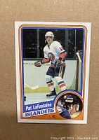 Front side of the 1984-85 Topps Pat LaFontaine rookie card #96 showing player image in Islanders uniform.