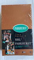 Front view of sealed 1992-93 Parkhurst NHL Series 2 hockey trading card box with brown and black design and player images