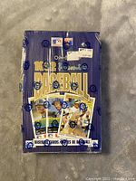 Front view of sealed 1992 OPC Premier Baseball card box showing player images and sealed wrapping.