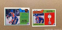 Fronts of two 1983-84 O-Pee-Chee Wayne Gretzky hockey cards, card #203 and card #216