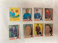 Front side of eight 1969-70 O-Pee-Chee hockey cards showing player portraits including Ed Giacomin (All Star), Glen Sather, Ken Schinkel, Claude Thibault, Ed Joyal, Ron Schock, Ed Van Impe, and Phil Goyette.