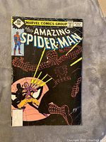 Front cover of The Amazing Spider-Man issue #188 comic book featuring Spider-Man and another character in action with a black background, price 35¢