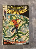 Front cover showing Spider-Man and Quicksilver artwork with publication details and price.