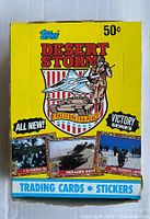 Front view of the sealed Topps Desert Storm wax box with yellow background and military-themed artwork