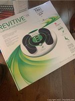 Front view of the Revitive IX Circulation Booster box showing product image and branding.