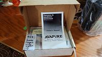 Boxed Avapure Reverse Osmosis Drinking Water System with Owner's Manual and instructions inside.