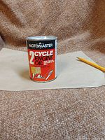 Photo of vintage Motomaster 2 Cycle Engine Oil can, 8.8 fl oz, showing front label and condition.