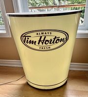 Front view of illuminated sign showing “Always Tim Hortons Fresh” logo