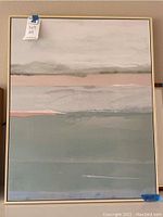 Front view of framed abstract landscape painting showing horizontal bands of muted colors.