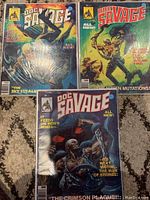 Three Doc Savage comic books from mid 1970s, issues 6,7,8, shown bagged and boarded with colorful illustrated covers.