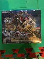 Full sealed booster box showing cover artwork and KONAMI security wrapping.